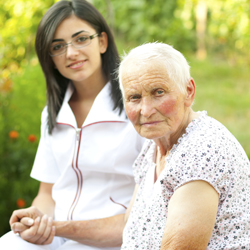 Personal care worker with elderly woman