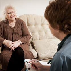 Female worker talking to another staff member