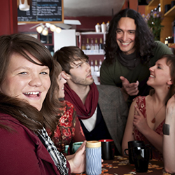 Group of happy people in cafe