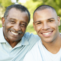 Portrait of two men smiling