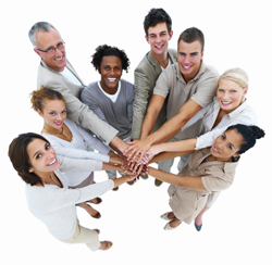 Group of people’s hands together in a stack