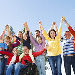 Group of people with their hands in the air